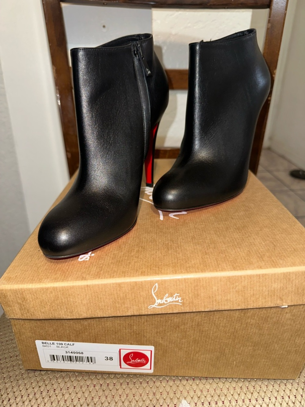 Christian Louboutin Black Leather Ankle Booties with Red Sole Accents
